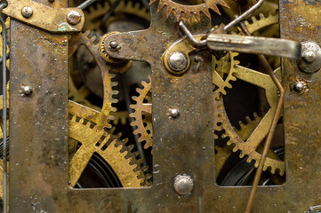Machine is an apparatus using mechanic power and having several parts, each with a definite function and together performing a particular task. Here is the image of a machine with some parts in focus.