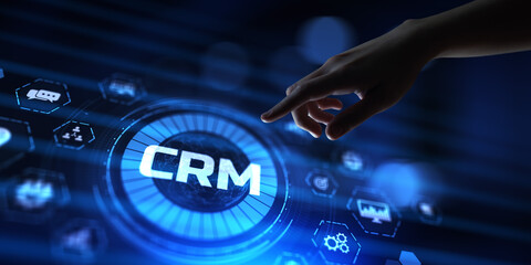 CRM Customer relationship management concept. Hand pressing button on screen.