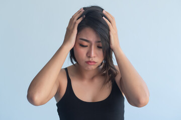 sick asian woman suffering from headache or dizziness