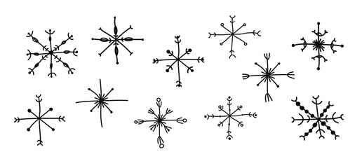 A set of snowflakes hand-drawn in boho style. Vector illustration for the decor of New Year's compositions, Christmas greetings in boho style.