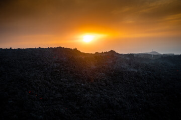 Lava flows at sunset. La Palma volcano eruption, in Canary Islands (Spain) - november, 2021.