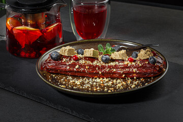 Traditional french eclairs with chocolate. Chef cuisine