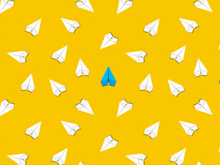 Business for new ideas creativity, innovation and solution concept, blue paper plane standing out from the group on yellow background. Business startup different from others. Vector seamless pattern.