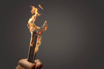 Wrench tool on fire with copy space