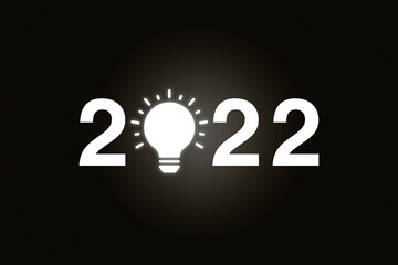 Happy New Year 2022. Hand and realistic light bulb icon