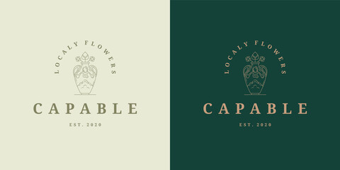 Flowers in vase logo emblem design template vector illustration in minimal line art style