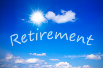 Retirement written on a sunny blue sky, symbol for anticipating old-age pension as a carefree life with endless holidays.