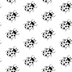 Hand drawn cute doodle ladybug seamless pattern. Vector illustration for fabric, tectile. kids clothes.