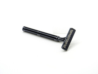 disposable black shaver on a white background