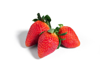 Fresh seasonal strawberries isolated from the background