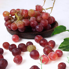A grape is a fruit, botanically a berry, of the deciduous woody vines of the flowering plant genus Vitis. Grapes can be eaten fresh as table grapes, or used for making wine, juice, and jellyjam.