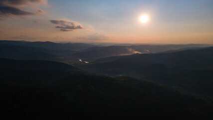 Mountains forest at sunset top view