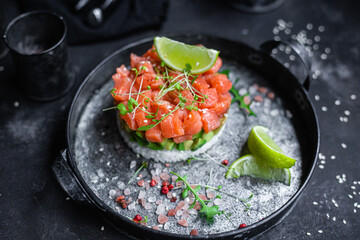 salmon and avocado tartare on a plate