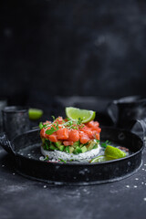 salmon and avocado tartare on a plate