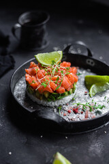 salmon and avocado tartare on a plate
