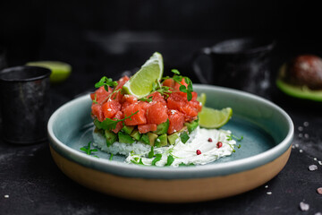 salmon and avocado tartare on a plate