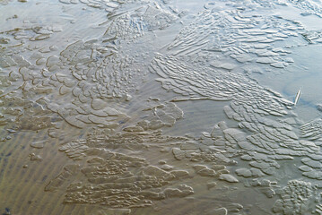 The ice texture of a frozen sand quarry . Leningrad region, Vsevolozhsk.