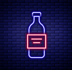 Glowing neon line Glass bottle of vodka icon isolated on brick wall background. Colorful outline concept. Vector