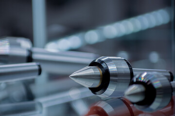 The center is rotating. Revolving lathe center for mounting and clamping revolving type parts on...