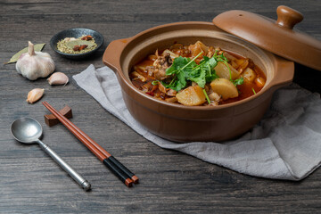 Delicious stewed mutton with radish in casserole