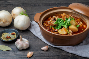 Delicious stewed mutton with radish in casserole