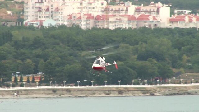 Gelendzhik, Russia, September. Seaplane SK-12 Orion RA-1743G taxis to hydroaerodrome in Gelendzhik Bay. Close-up. Hydroaviation show 2014.	
