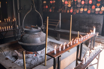 Eternal fire and big tea kettle at Reikado Hall in Mt. Misen, Miyajima,...
