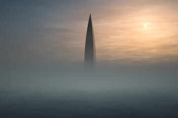 Fototapeta premium Tall lonely skyscraper sticking out of the fog