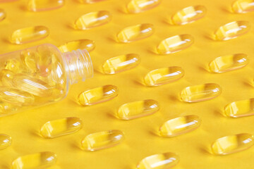 yellow capsules of omega fish