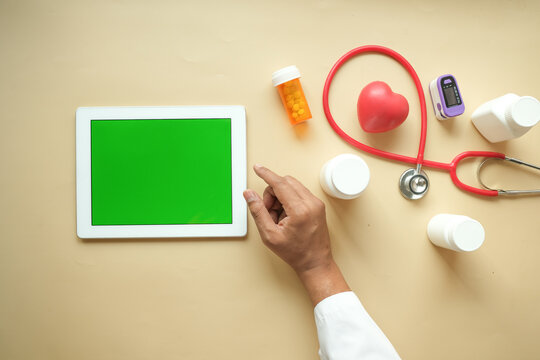 Doctor In White Coat Is Using A Digital Tablet, Top Down 