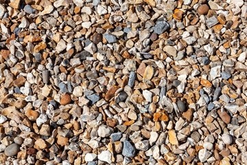 Gravel background of rock pebble stones used for landscaping and pathways in gardens with a nice texture pattern, stock photo image
