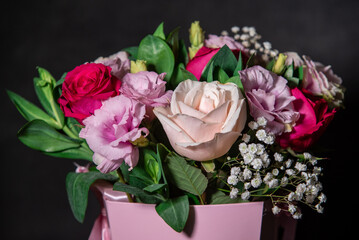 Beautiful bouquet of colorful rose flowers. Festive flowers concept.  Bouquet of fresh roses, freesias, eustoma and others.