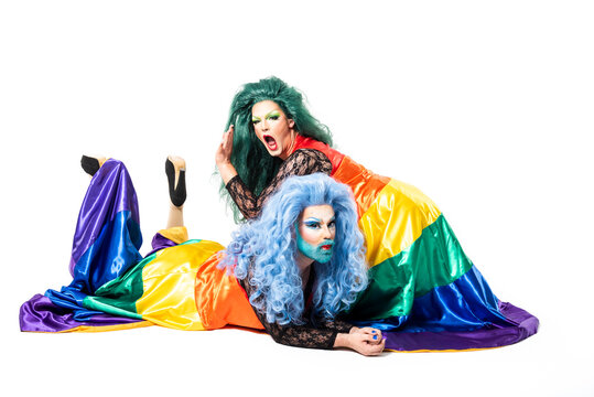Drag queens lying over white background
