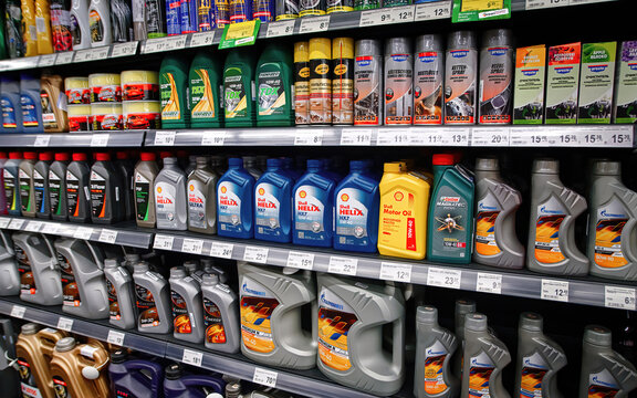 Minsk, Belarus. Feb 2021. Motor Oils, Car Lubricants And Additives In Large Supermarket. Assortment Of Car Care Products And Accesories In Auto Parts Store