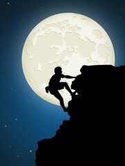 man climbs the cliff in the moonlight