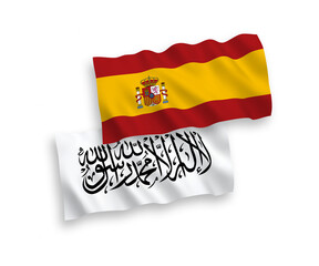 Obraz premium National vector fabric wave flags of Taliban and Spain isolated on white background. 1 to 2 proportion.