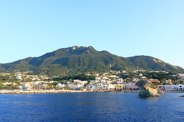 Fototapeta na wymiar View to the Coastal landscape of Lacco Ameno from the sea, Mediterranean Sea coast, bay of Naples, Ischia island, Italy