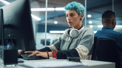 In Diverse Multi-Ethnic Office: Portrait of Young Stylish Woman Working on Desktop Computer....