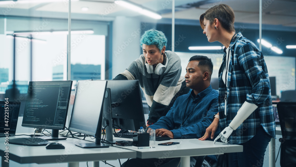 Poster Team Meeting In Diverse Office: Project Manager with Disability points Prosthetic Arm at Computer Screen Talks with Multi-Ethnic Specialists. Software Engineers Collaborate on Creative Solution