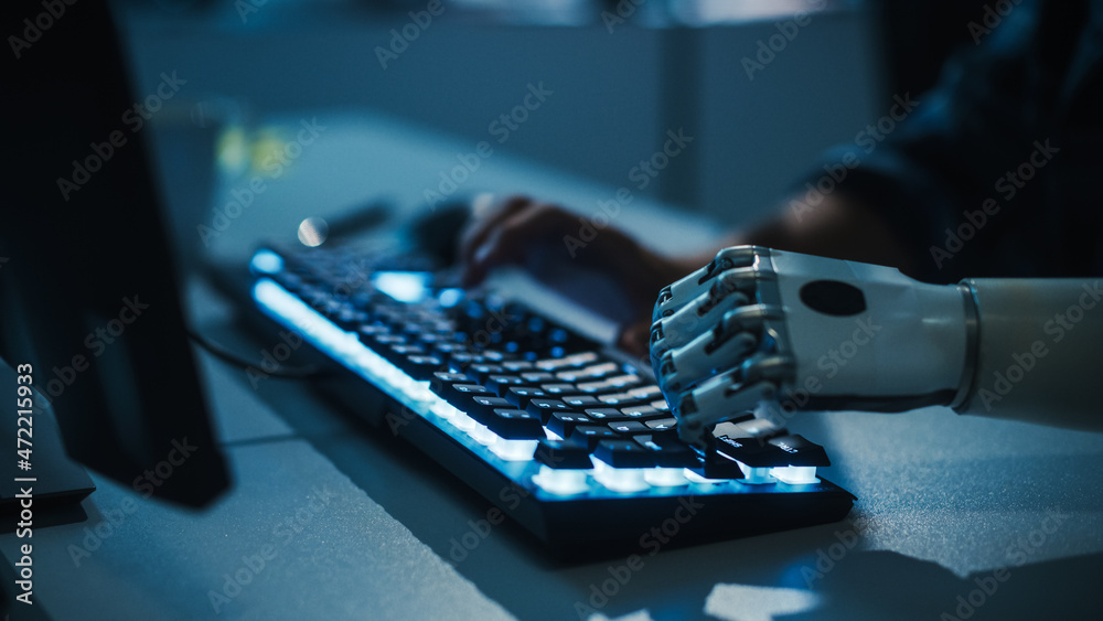 Poster Close-up on Hands: Programmer With Disability Using Prosthetic Arm to Work on Computer Keyboard. Specialist Swift and Natural Use of Myoelectric Bionic Hand To Type Code for Software at Night
