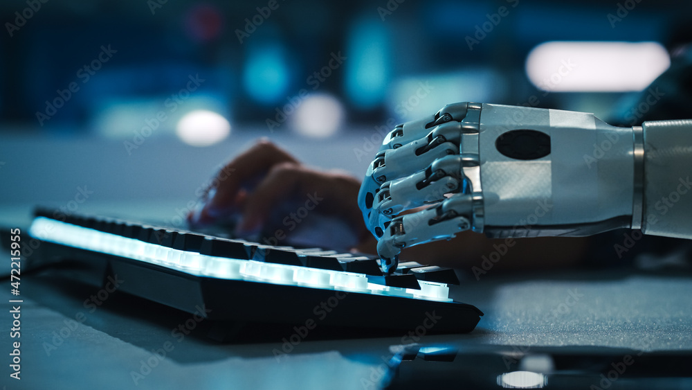 Poster Close-up on Hands: Programmer With Disability Using Prosthetic Arm to Work on Backlit Computer Keyboard. Specialist Swift and Natural Use of Myoelectric Bionic Hand To Type for e-Commerce Software
