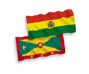 National vector fabric wave flags of Grenada and Bolivia isolated on white background. 1 to 2 proportion.