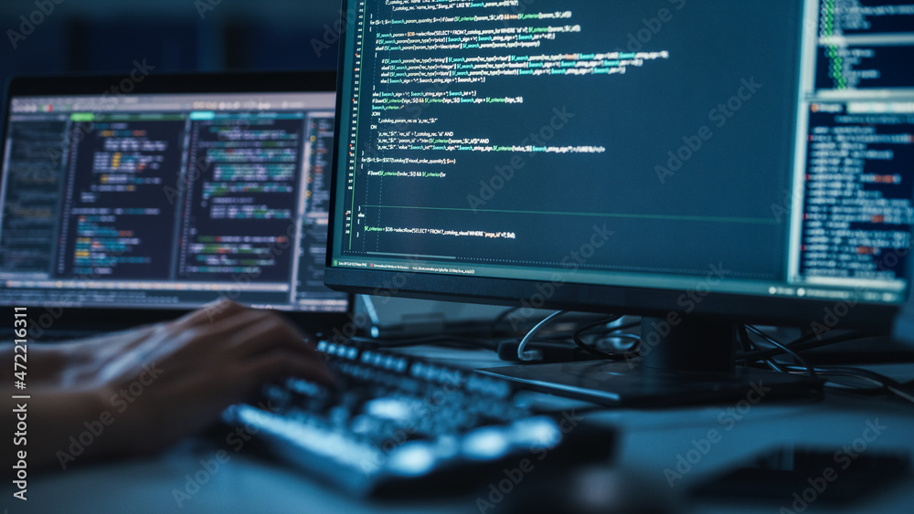 Poster Close-up Focus on Person's Hands Typing on the Desktop Computer Illuminated Keyboard. Screens Show Coding Language User Interface. Software Engineer Create Innovative Commerce App. Program Development