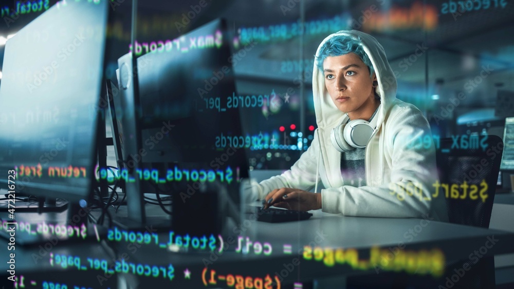 Poster Late at Night in Office: Portrait of Young Stylish Freelancer Woman Working on Desktop Computer. Non-Binary Person Creating Modern Content. Shot with Visualisation of Running Script Code on Foreground