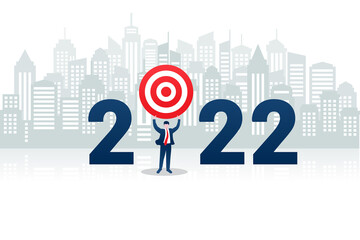 illustration of a businessman lifting a target for 2022 with a city view in the background.