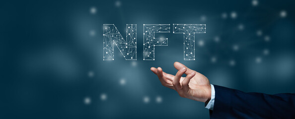 man holding non fungible token hologram