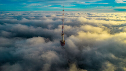 Obraz premium Aerial view of the television tower in the fog