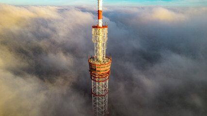 Obraz premium Aerial view of the television tower in the fog