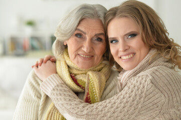 Close up portrait of enior woman with daughter