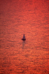 Sailboat in evening sun